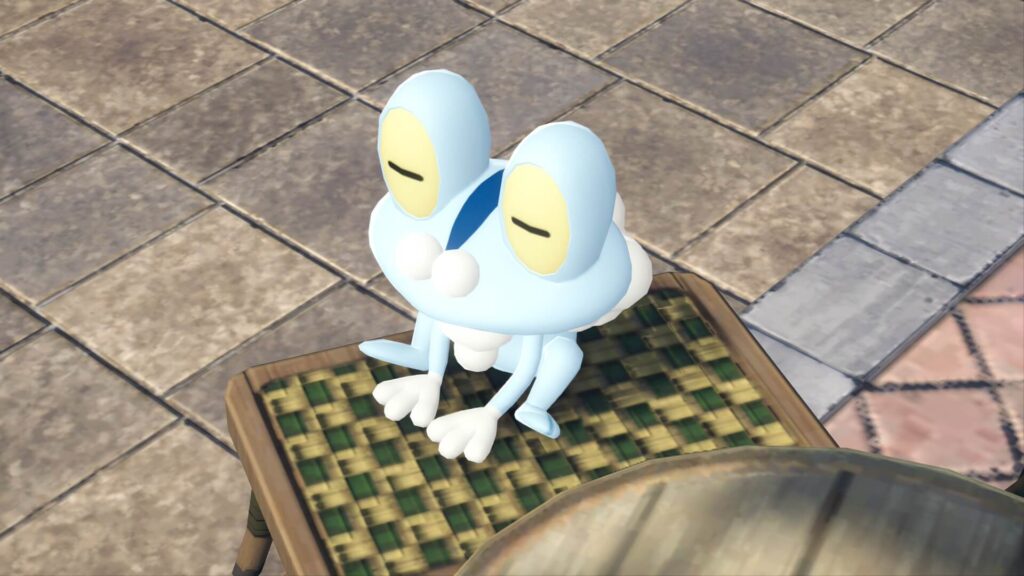 ポケモンレジェンズZAにあるカフェ・ソレイユで日当たりの良い席に座る色違いケロマツ