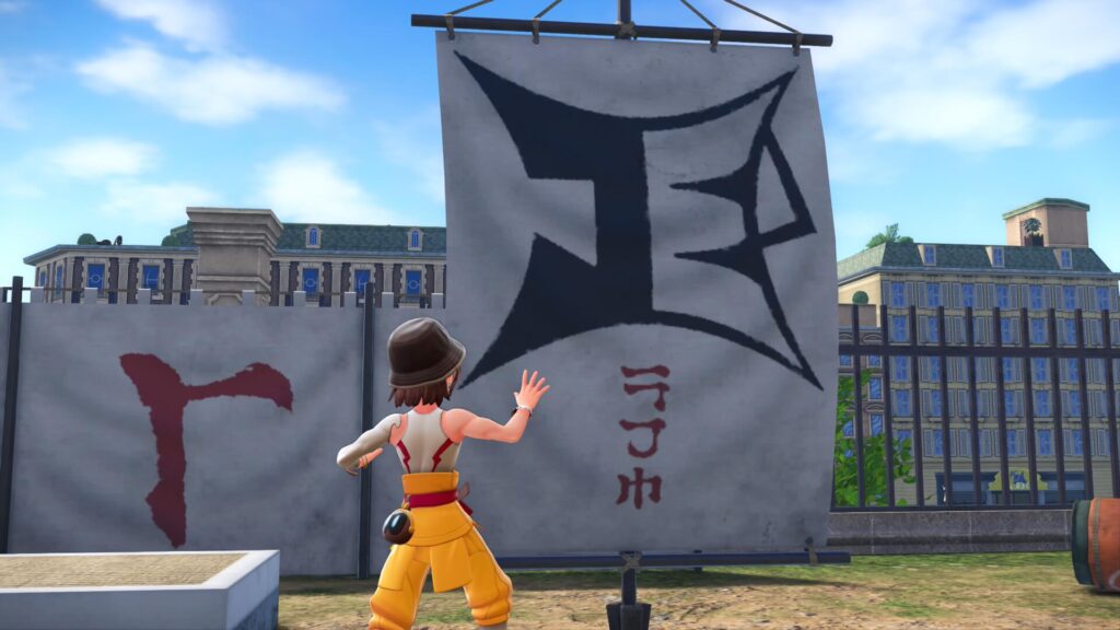 ポケモンレジェンズZAの道場にあるジャスティスの会のロゴが入った
旗